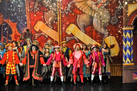 ensemble red and gold panto costumes